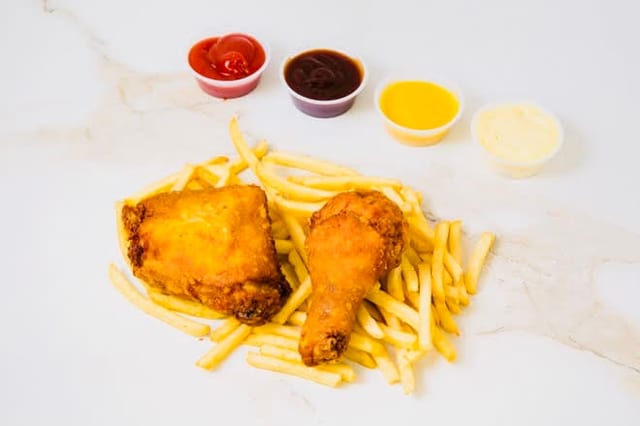 2 Piece Chicken (Leg and Thigh) with French Fries.