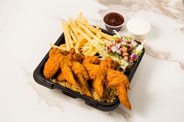 CHICKEN WINGS OVER RICE.