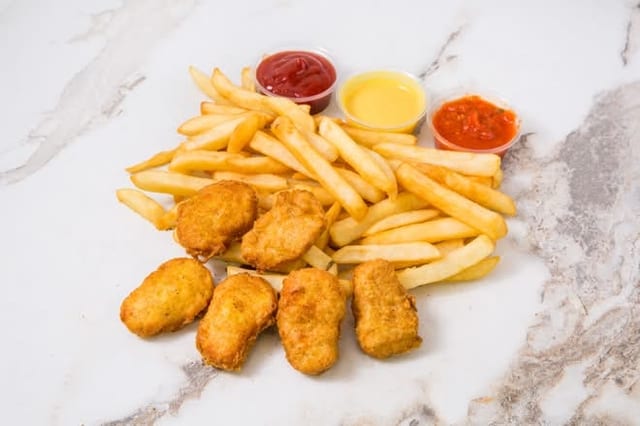 6 pieces Chicken Nuggets with French Fries.